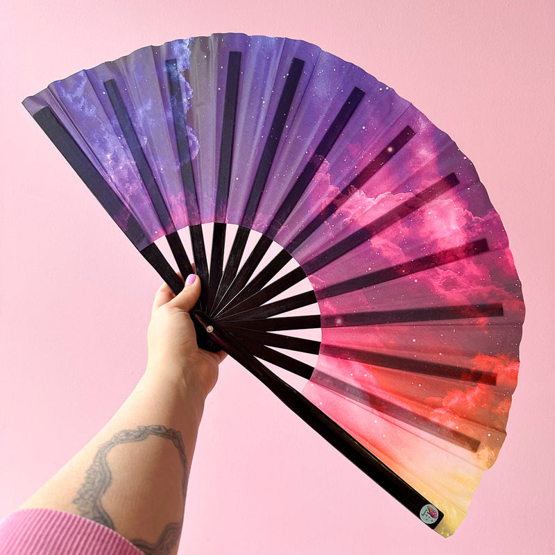 Giant Clacking Hand Fan with Rainbow Cloudscape print (Glows in UV!)